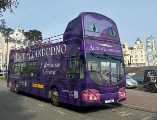 Alpine launches Alice in Llandudno Open Top Bus Tour